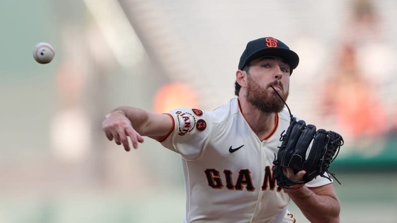 Aug 14, 2023; San Francisco, California, USA; San Francisco Giants starting pitcher Ryan Walker (74) throws a pitch against the Tampa Bay Rays during the first inning at Oracle Park. Mandatory Credit: Robert Edwards-USA TODAY Sports