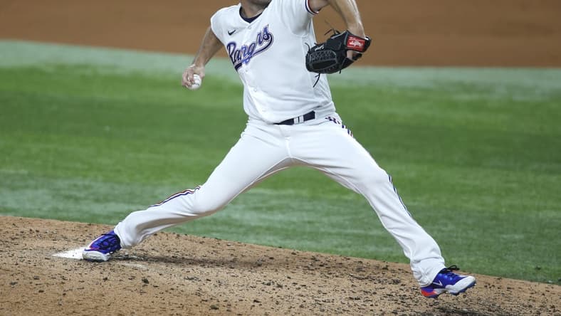 Aug 14, 2023; Arlington, Texas, USA; Texas Rangers starting pitcher Max Scherzer (31) throws a pitch in the fourth inning against the Los Angeles Angels at Globe Life Field. Mandatory Credit: Tim Heitman-USA TODAY Sports