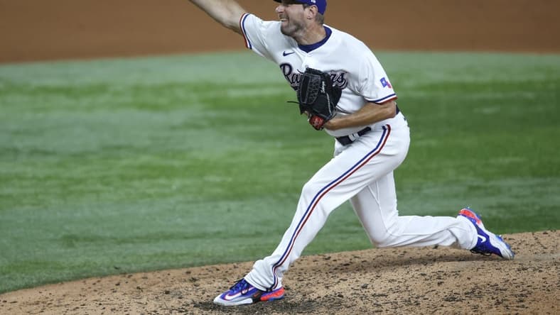 Aug 14, 2023; Arlington, Texas, USA; Texas Rangers starting pitcher Max Scherzer (31) pitches against the Los Angeles Angels in the fifth inning at Globe Life Field. Mandatory Credit: Tim Heitman-USA TODAY Sports