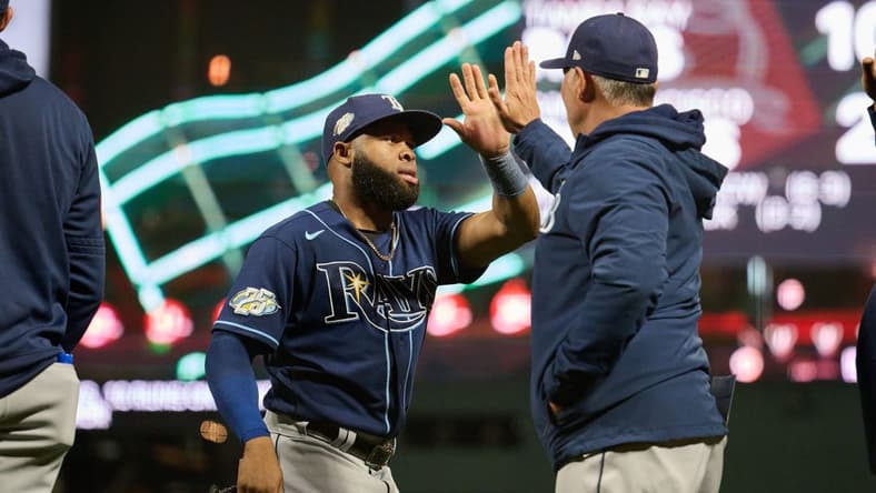 Aug 14, 2023; San Francisco, California, USA; Tampa Bay Rays infielder Osleivis Basabe (37) shakes hands with a coach after the final out of the ninth inning against the San Francisco Giants at Oracle Park. Mandatory Credit: Robert Edwards-USA TODAY Sports