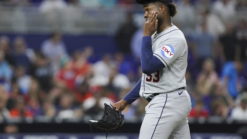 Aug 15, 2023; Miami, Florida, USA; Houston Astros starting pitcher Cristian Javier (53) reacts after a throwing error against the Miami Marlins during the fifth inning at loanDepot Park. Mandatory Credit: Sam Navarro-USA TODAY Sports