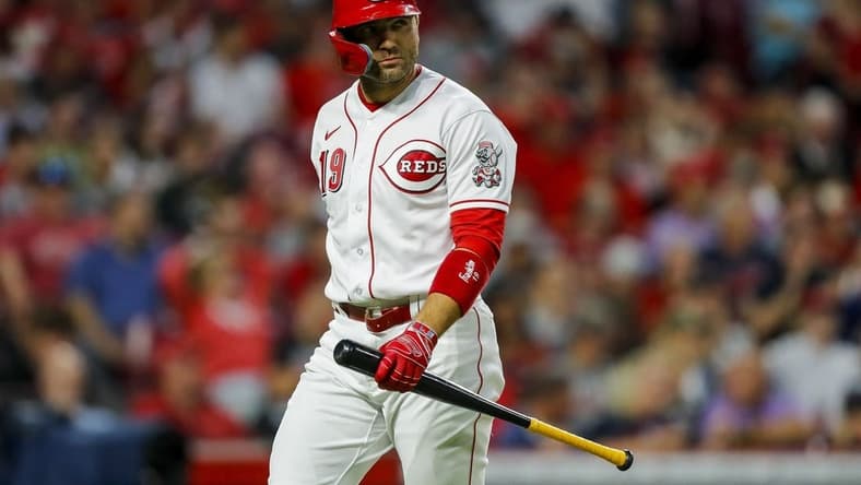 Aug 15, 2023; Cincinnati, Ohio, USA; Cincinnati Reds pinch hitter Joey Votto (19) walks off the field after striking out against the Cleveland Guardians in the seventh inning at Great American Ball Park. Mandatory Credit: Katie Stratman-USA TODAY Sports