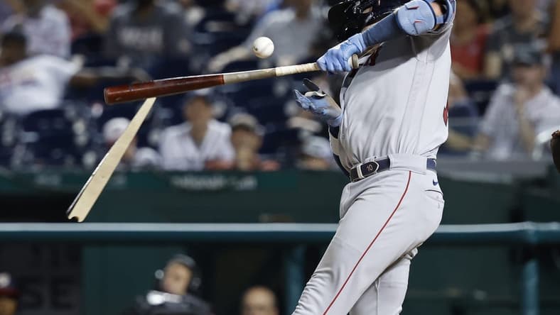 Aug 15, 2023; Washington, District of Columbia, USA; Boston Red Sox shortstop Trevor Story (10) breaks his bat against the Washington Nationals during the eighth inning at Nationals Park. Mandatory Credit: Geoff Burke-USA TODAY Sports