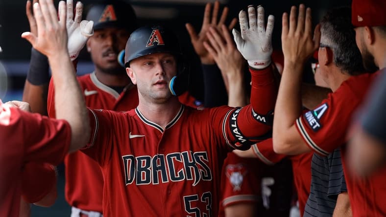 Aug 16, 2023; Denver, Colorado, USA; Arizona Diamondbacks first baseman Christian Walker (53) celebrates his two run home run in the first inning against the Colorado Rockies at Coors Field. Mandatory Credit: Isaiah J. Downing-USA TODAY Sports