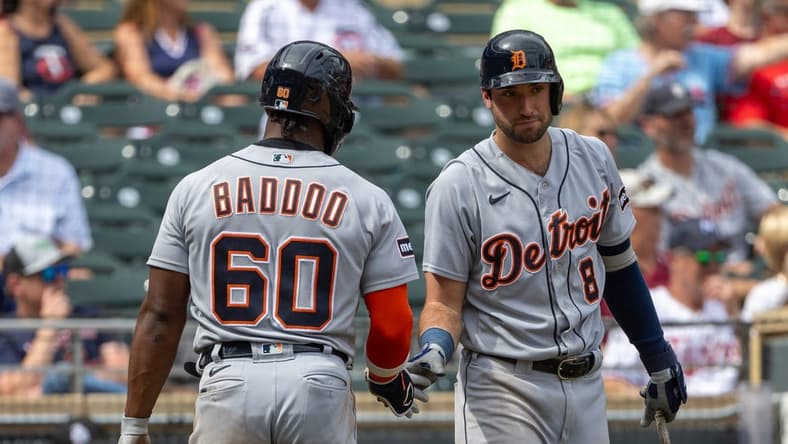 Aug 16, 2023; Minneapolis, Minnesota, USA; Detroit Tigers left fielder Akil Baddoo (60) celebrates with third baseman Matt Vierling (8) after scoring a run against the Minnesota Twins in the ninth inning at Target Field. Mandatory Credit: Jesse Johnson-USA TODAY Sports