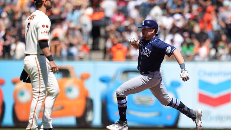 Aug 16, 2023; San Francisco, California, USA; Tampa Bay Rays first baseman Luke Raley (55) hits an inside the park home run during the sixth inning against the San Francisco Giants  at Oracle Park. Mandatory Credit: Sergio Estrada-USA TODAY Sports