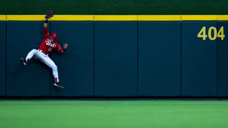 Cincinnati Reds left fielder TJ Friedl (29) catches a fly ball hit by Cleveland Guardians right fielder Ramon Laureano (10) in the third inning of the MLB baseball game between the Cincinnati Reds and the Cleveland Guardians at Great American Ball Park in Cincinnati on Wednesday, Aug. 16, 2023.