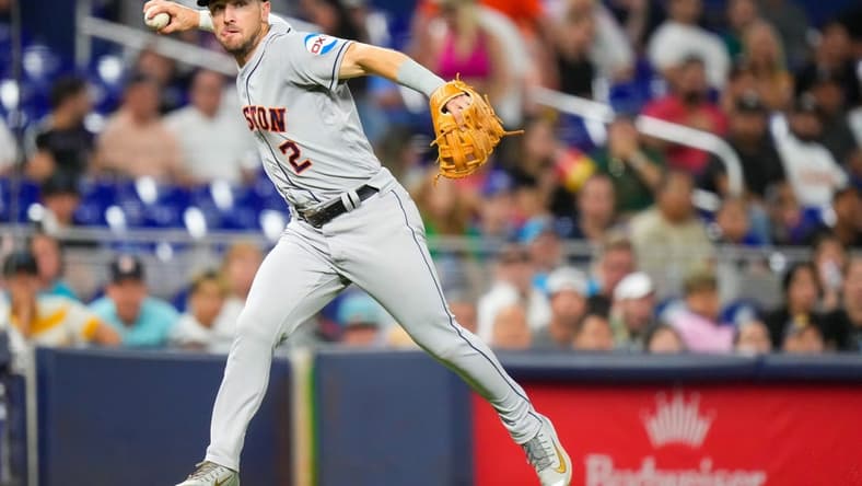 Aug 16, 2023; Miami, Florida, USA; Houston Astros third baseman Alex Bregman (2) throws the ball to first base for an out against the Miami Marlins during the seventh inning at loanDepot Park. Mandatory Credit: Rich Storry-USA TODAY Sports