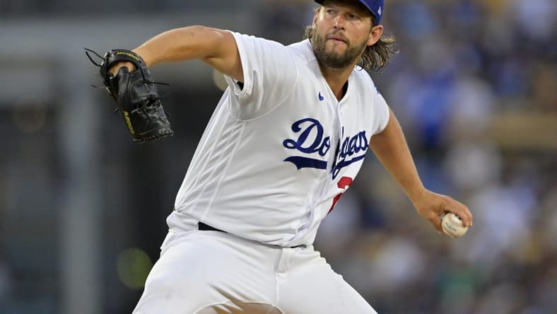 Aug 16, 2023; Los Angeles, California, USA;  Los Angeles Dodgers starting pitcher Clayton Kershaw (22) throws to the plate in the second inning against the Milwaukee Brewers at Dodger Stadium. Mandatory Credit: Jayne Kamin-Oncea-USA TODAY Sports