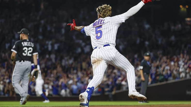 Aug 16, 2023; Chicago, Illinois, USA; Chicago Cubs second baseman Christopher Morel (5) celebrates as he rounds the bases after hitting a three-run walk-off home run against the Chicago White Sox during the ninth inning at Wrigley Field. Mandatory Credit: Kamil Krzaczynski-USA TODAY Sports