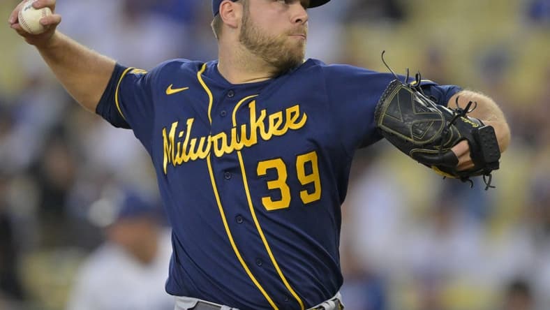 Aug 17, 2023; Los Angeles, California, USA; Milwaukee Brewers starting pitcher Corbin Burnes (39) throws to the plate in the first inning against the Los Angeles Dodgers at Dodger Stadium. Mandatory Credit: Jayne Kamin-Oncea-USA TODAY Sports