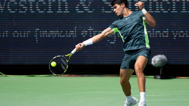 Carlos Alcaraz of Spain, hits a forehand return to Max Purcell of Australia during the quarterfinals of the Western & Southern Open at the Lindner Family Tennis Center in Mason Friday, August, 18, 2023.