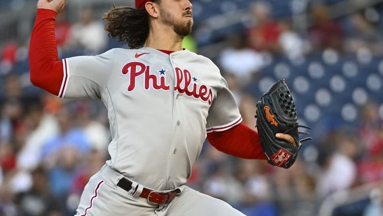 Aug 18, 2023; Washington, District of Columbia, USA; Philadelphia Phillies starting pitcher Michael Lorenzen (22) throws to the Washington Nationals during the second inning the at Nationals Park. Mandatory Credit: Brad Mills-USA TODAY Sports