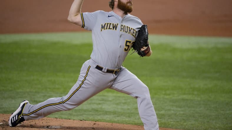 Aug 18, 2023; Arlington, Texas, USA; Milwaukee Brewers starting pitcher Brandon Woodruff (53) pitches against the Texas Rangers during the first inning at Globe Life Field. Mandatory Credit: Jerome Miron-USA TODAY Sports