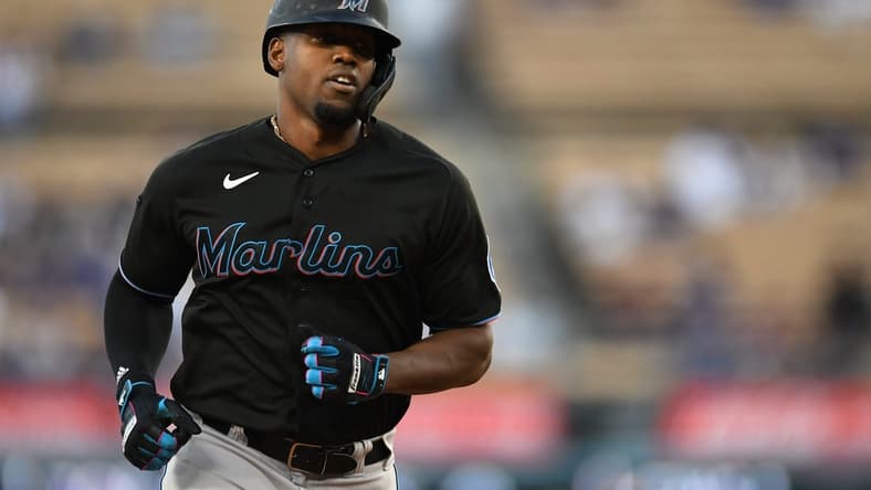 Aug 18, 2023; Los Angeles, California, USA; Miami Marlins designated hitter Jorge Soler (12) runs the bases after hitting a home run against the Los Angeles Dodgers during the first inning at Dodger Stadium. Mandatory Credit: Jonathan Hui-USA TODAY Sports