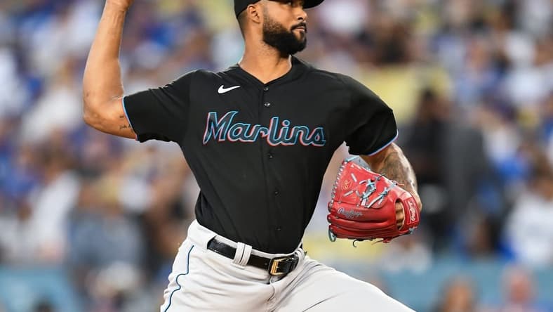 Aug 18, 2023; Los Angeles, California, USA; Miami Marlins starting pitcher Sandy Alcantara (22) throws a pitch against the Los Angeles Dodgers during the first inning at Dodger Stadium. Mandatory Credit: Jonathan Hui-USA TODAY Sports
