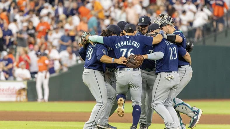 Aug 18, 2023; Houston, Texas, USA;  The Seattle Mariners celebrate defeating the Houston Astros at Minute Maid Park. Mandatory Credit: Thomas Shea-USA TODAY Sports