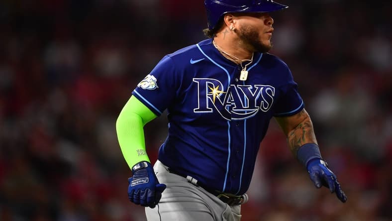 Aug 18, 2023; Anaheim, California, USA; Tampa Bay Rays designated hitter Harold Ramirez (43) runs after hitting an RBI single against the Los Angeles Angels during the seventh inning at Angel Stadium. Mandatory Credit: Gary A. Vasquez-USA TODAY Sports