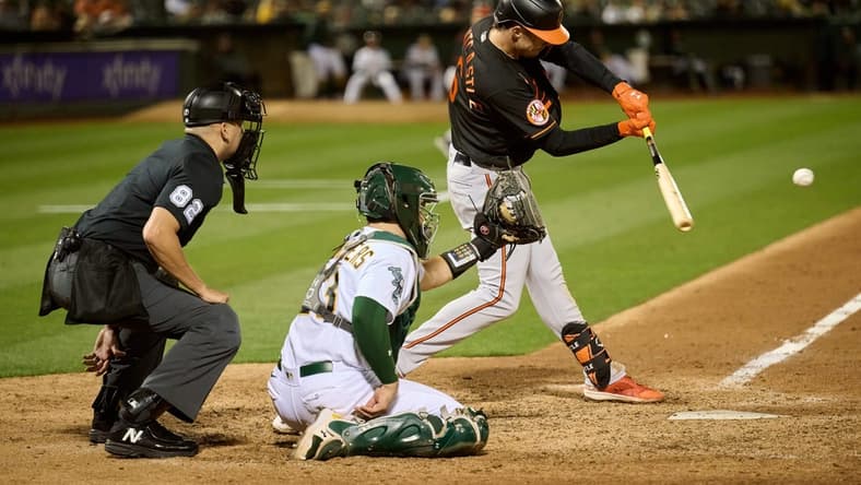 Aug 18, 2023; Oakland, California, USA; Baltimore Orioles designated hitter Ryan Mountcastle (6) bats against the Oakland Athletics during the eighth inning at Oakland-Alameda County Coliseum. Mandatory Credit: Robert Edwards-USA TODAY Sports