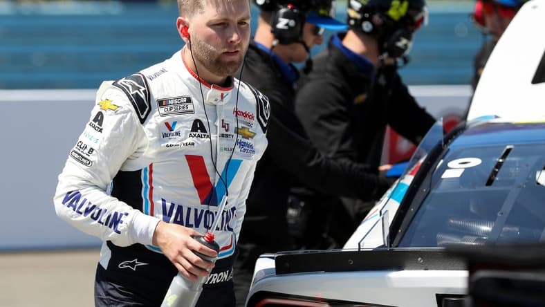 Aug 19, 2023; Watkins Glen, New York, USA; NASCAR Cup Series driver William Byron exits his race car during practice and qualifying for the Go Bowling at The Glen at Watkins Glen International. Mandatory Credit: Matthew O'Haren-USA TODAY Sports