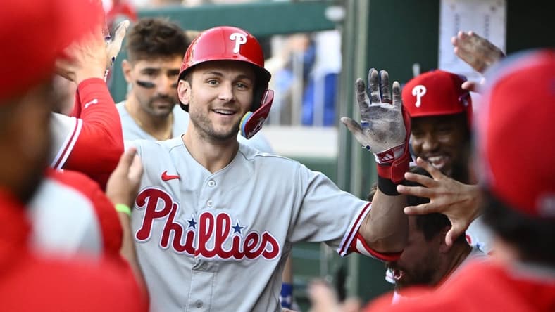 Aug 19, 2023; Washington, District of Columbia, USA; Philadelphia Phillies shortstop Trea Turner (7) is congratulated by teammates after hitting his second home run of the eighth inning against the Washington Nationals at Nationals Park. Mandatory Credit: Brad Mills-USA TODAY Sports