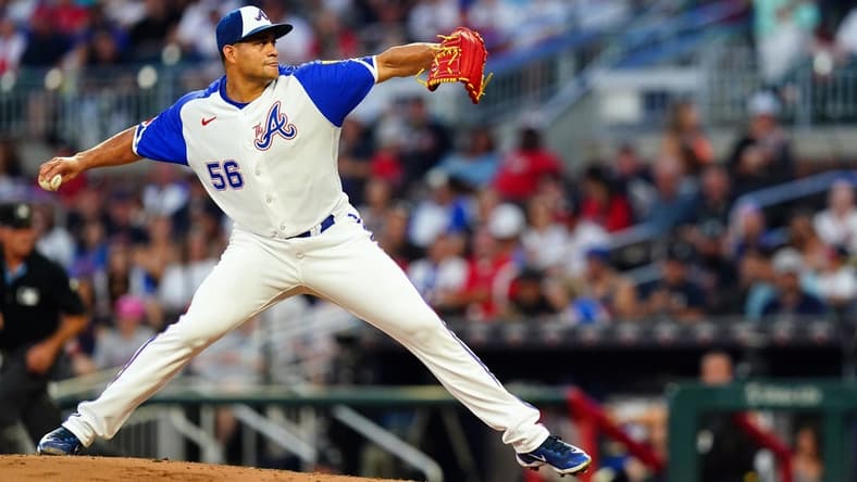 Aug 19, 2023; Cumberland, Georgia, USA; Atlanta Braves relief pitcher Yonny Chirinos (56) cycles through a pitch against the San Francisco Giants during the fourth inning at Truist Park. Mandatory Credit: John David Mercer-USA TODAY Sports