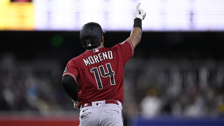Aug 19, 2023; San Diego, California, USA; Arizona Diamondbacks catcher Gabriel Moreno (14) rounds the bases after hitting a grand slam home run against the San Diego Padres during the seventh inning at Petco Park. Mandatory Credit: Orlando Ramirez-USA TODAY Sports