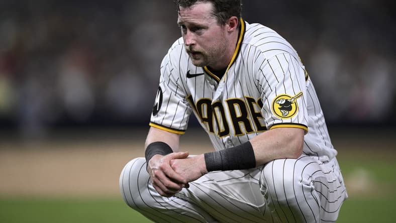 Aug 19, 2023; San Diego, California, USA; San Diego Padres first baseman Jake Cronenworth (9) looks on during the eighth inning against the Arizona Diamondbacks at Petco Park. Mandatory Credit: Orlando Ramirez-USA TODAY Sports