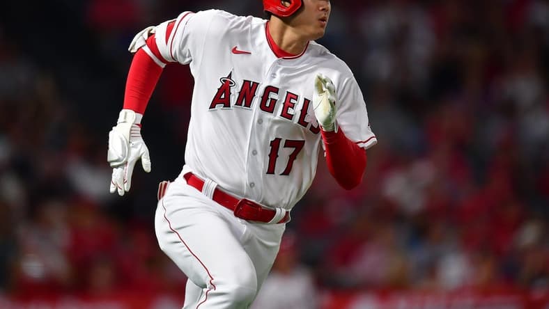 Aug 19, 2023; Anaheim, California, USA; Los Angeles Angels designated hitter Shohei Ohtani (17) runs after hitting a double against the Tampa Bay Rays during the eighth inning at Angel Stadium. Mandatory Credit: Gary A. Vasquez-USA TODAY Sports