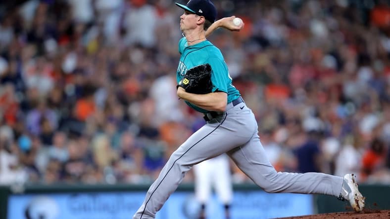 Aug 20, 2023; Houston, Texas, USA; Seattle Mariners starting pitcher Emerson Hancock (62) delivers a pitch against the Houston Astros during the first inning at Minute Maid Park. Mandatory Credit: Erik Williams-USA TODAY Sports