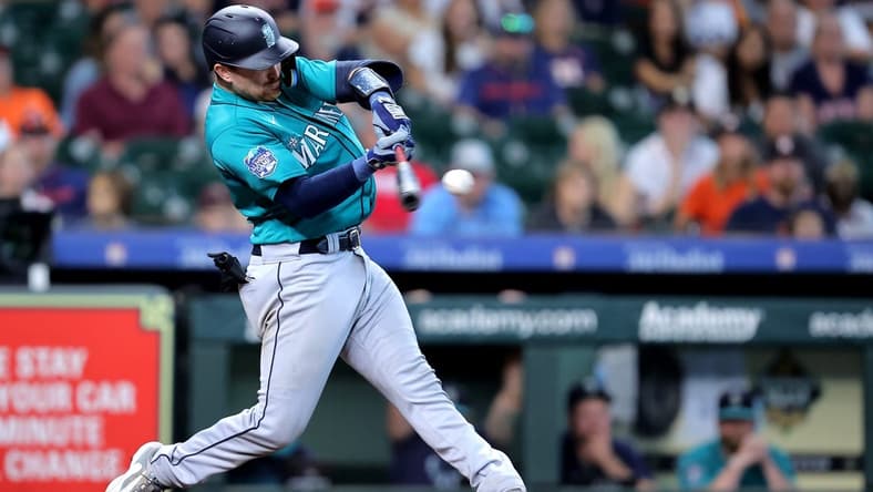 Aug 20, 2023; Houston, Texas, USA; Seattle Mariners catcher Brian O'Keefe (64) hits an RBI double to left field against the Houston Astros during the third inning at Minute Maid Park. Mandatory Credit: Erik Williams-USA TODAY Sports