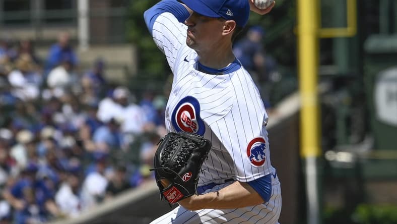 Aug 20, 2023; Chicago, Illinois, USA; Chicago Cubs starting pitcher Kyle Hendricks (28) delivers against the Kansas City Royals during the first inning at Wrigley Field. Mandatory Credit: Matt Marton-USA TODAY Sports