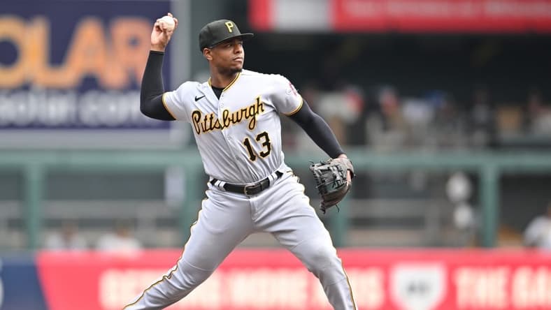 Aug 20, 2023; Minneapolis, Minnesota, USA; Pittsburgh Pirates third baseman Ke'Bryan Hayes (13) makes a putout against the Minnesota Twins during the third inning at Target Field. Mandatory Credit: Jeffrey Becker-USA TODAY Sports