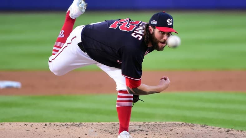 Aug 20, 2023; Williamsport, Pennsylvania, USA; Washington Nationals pitcher Trevor Williams (32) throws a pitch in the second inning against the Philadelphia Phillies at Muncy Bank Ballpark at Historic Bowman Field. Mandatory Credit: Evan Habeeb-USA TODAY Sports