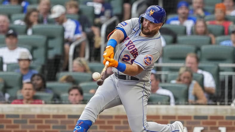Aug 21, 2023; Cumberland, Georgia, USA; New York Mets right fielder DJ Stewart (29) hits a home run against the Atlanta Braves during the second inning at Truist Park. Mandatory Credit: Dale Zanine-USA TODAY Sports
