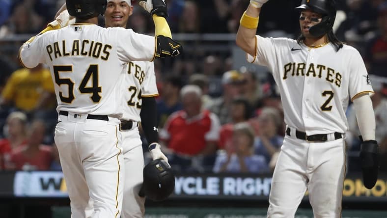 Aug 21, 2023; Pittsburgh, Pennsylvania, USA;  Pittsburgh Pirates right fielder Joshua Palacios (54) celebrates his  three run home run with catcher Endy Rodriguez (25) and  first baseman Connor Joe (2) against the St. Louis Cardinals during the fourth inning at PNC Park. Mandatory Credit: Charles LeClaire-USA TODAY Sports