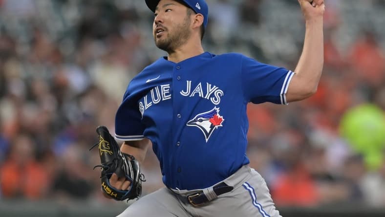 Aug 22, 2023; Baltimore, Maryland, USA;  Toronto Blue Jays starting pitcher Yusei Kikuchi (16) throws a first inning pitch against the Baltimore Orioles at Oriole Park at Camden Yards. Mandatory Credit: Tommy Gilligan-USA TODAY Sports