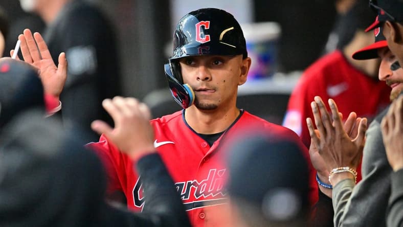 Aug 22, 2023; Cleveland, Ohio, USA; Cleveland Guardians second baseman Andres Gimenez (0) celebrates after scoring during the fourth inning against the Los Angeles Dodgers at Progressive Field. Mandatory Credit: Ken Blaze-USA TODAY Sports