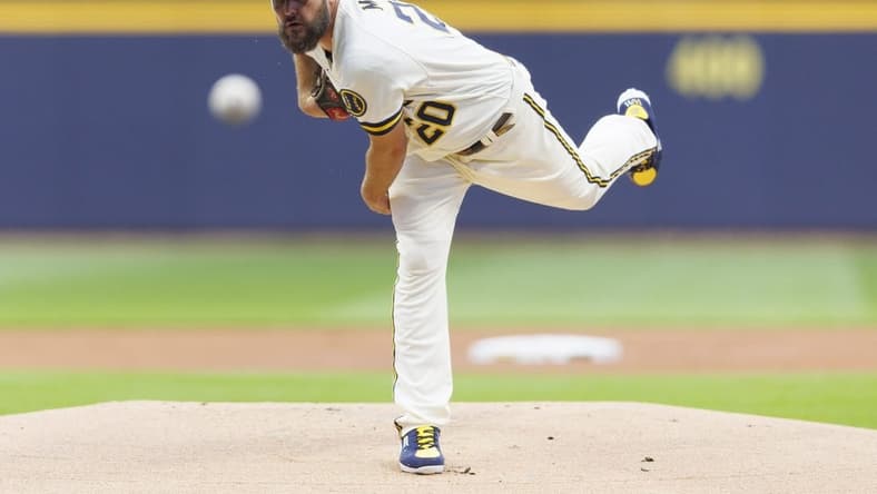 Aug 22, 2023; Milwaukee, Wisconsin, USA;  Milwaukee Brewers pitcher Wade Miley (20) throws a pitch during the first inning against the Minnesota Twins at American Family Field. Mandatory Credit: Jeff Hanisch-USA TODAY Sports