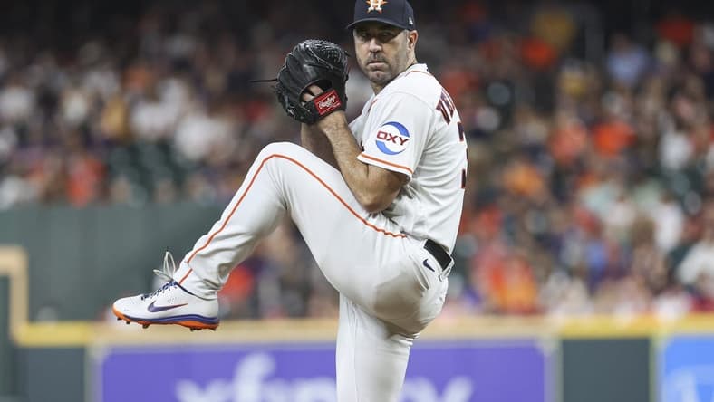Aug 22, 2023; Houston, Texas, USA; Houston Astros starting pitcher Justin Verlander (35) delivers a pitch during the second inning against the Boston Red Sox at Minute Maid Park. Mandatory Credit: Troy Taormina-USA TODAY Sports