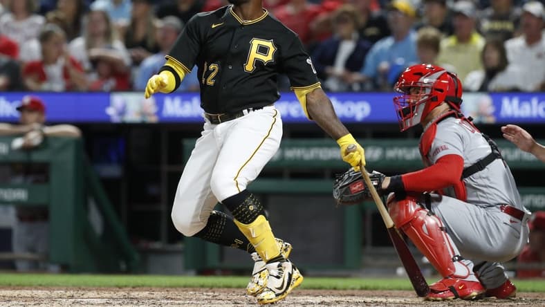 Aug 22, 2023; Pittsburgh, Pennsylvania, USA; Pittsburgh Pirates designated hitter Andrew McCutchen (22) hits a two run home run against the St. Louis Cardinals during the fifth inning at PNC Park. Mandatory Credit: Charles LeClaire-USA TODAY Sports