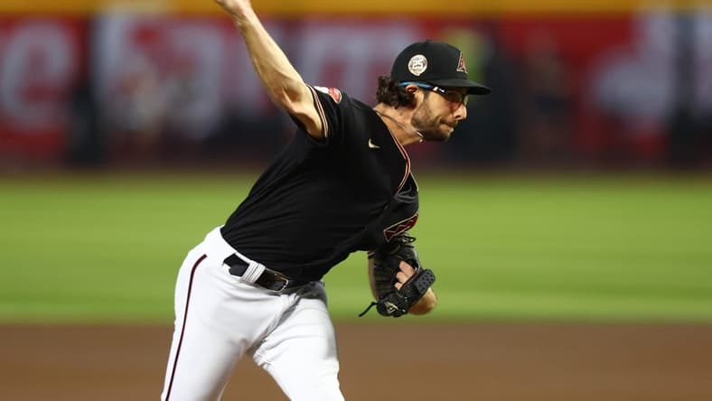 Aug 22, 2023; Phoenix, Arizona, USA; Arizona Diamondbacks pitcher Zac Gallen against the Texas Rangers at Chase Field. Mandatory Credit: Mark J. Rebilas-USA TODAY Sports