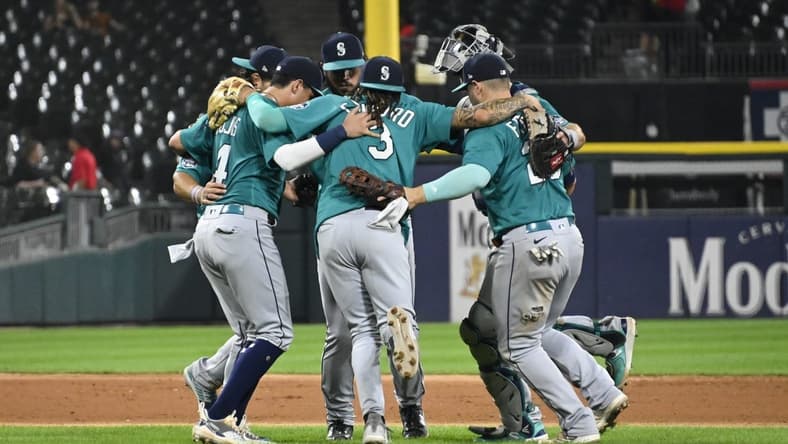 Aug 22, 2023; Chicago, Illinois, USA; The Seattle Mariners celebrate after the team s game against the Chicago White Sox at Guaranteed Rate Field. Mandatory Credit: Matt Marton-USA TODAY Sports