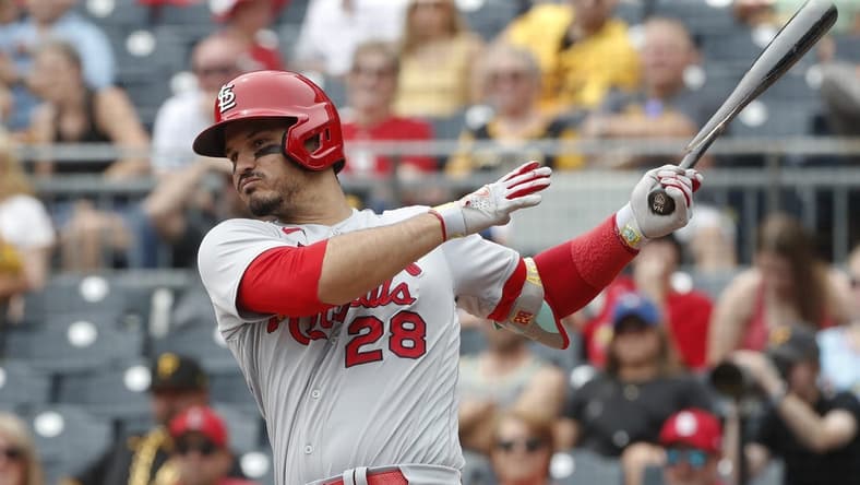 Aug 23, 2023; Pittsburgh, Pennsylvania, USA;  St. Louis Cardinals third baseman Nolan Arenado (28) hits a two run double against the Pittsburgh Pirates during the second inning at PNC Park. Mandatory Credit: Charles LeClaire-USA TODAY Sports