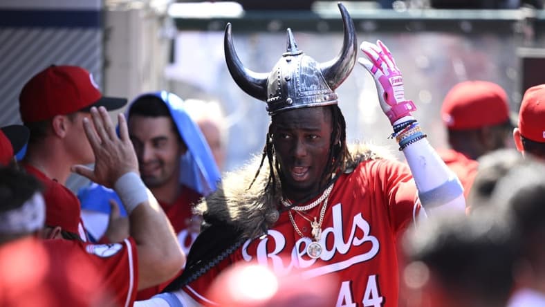 Aug 23, 2023; Anaheim, California, USA; Cincinnati Reds shortstop Elly De La Cruz (44) is congratulated in the dugout after hitting a three-run home run against the Los Angeles Angels during the fifth inning at Angel Stadium. Mandatory Credit: Orlando Ramirez-USA TODAY Sports