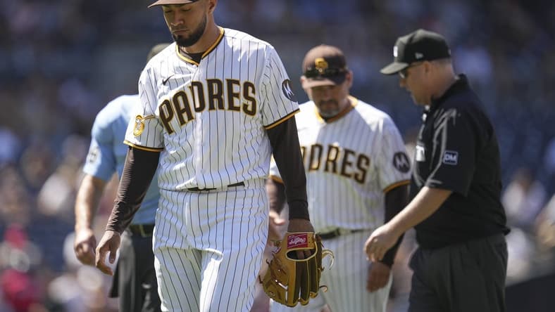 Aug 23, 2023; San Diego, California, USA;  San Diego Padres relief pitcher Robert Suarez (75) is ejected before throwing a pitch against the Miami Marlins during the seventh inning at Petco Park. Mandatory Credit: Ray Acevedo-USA TODAY Sports