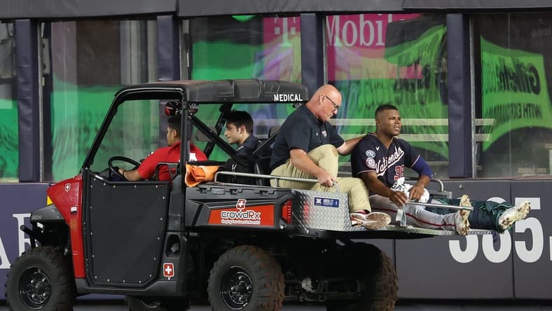 Aug 23, 2023; Bronx, New York, USA; Washington Nationals left fielder Stone Garrett (36) is driven off  the field after an injury during the seventh inning against the New York Yankees at Yankee Stadium. Mandatory Credit: Vincent Carchietta-USA TODAY Sports