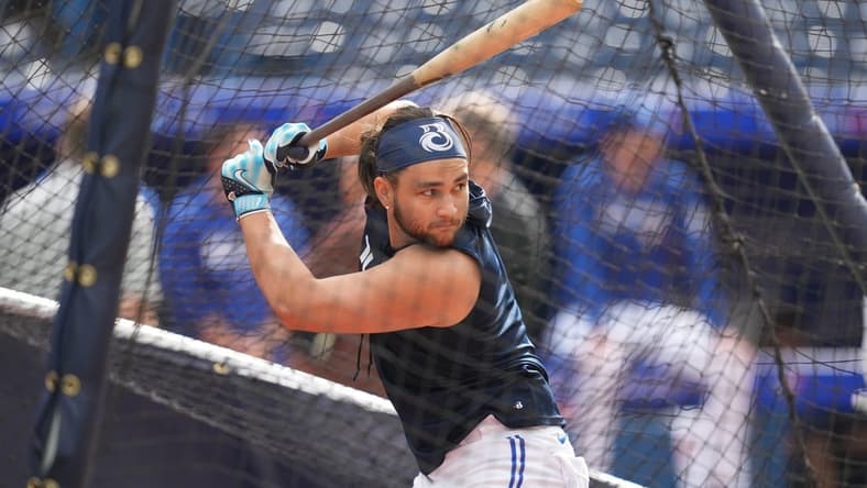 Aug 25, 2023; Toronto, Ontario, CAN; Toronto Blue Jays shortstop Bo Bichette (11) takes batting practice before a game against the Cleveland Guardians at Rogers Centre. Mandatory Credit: Nick Turchiaro-USA TODAY Sports
