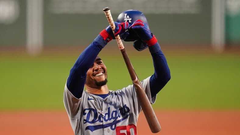 Aug 25, 2023; Boston, Massachusetts, USA; Los Angeles Dodgers right fielder Mookie Betts (50) reacts to the crowd before batting against the Boston Red Sox in the first inning at Fenway Park. Mandatory Credit: David Butler II-USA TODAY Sports