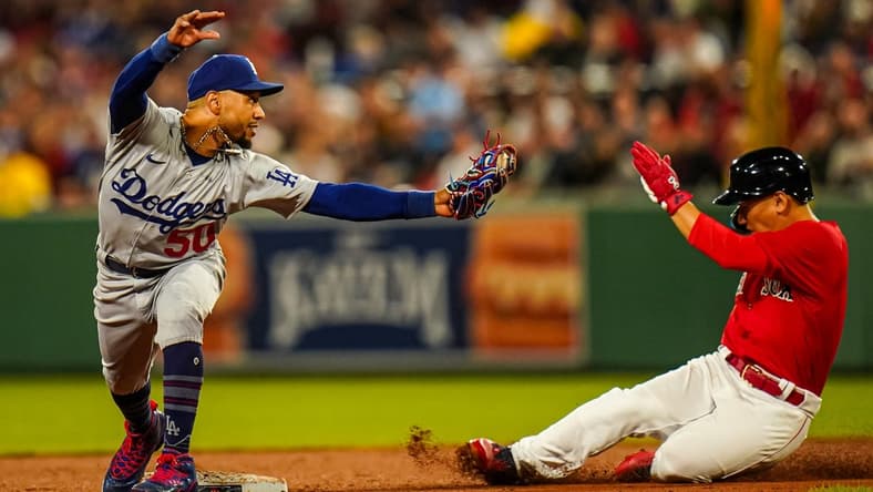 Aug 25, 2023; Boston, Massachusetts, USA; Los Angeles Dodgers right fielder Mookie Betts (50) makes the out at second base against the Boston Red Sox in the fifth inning at Fenway Park. Mandatory Credit: David Butler II-USA TODAY Sports
